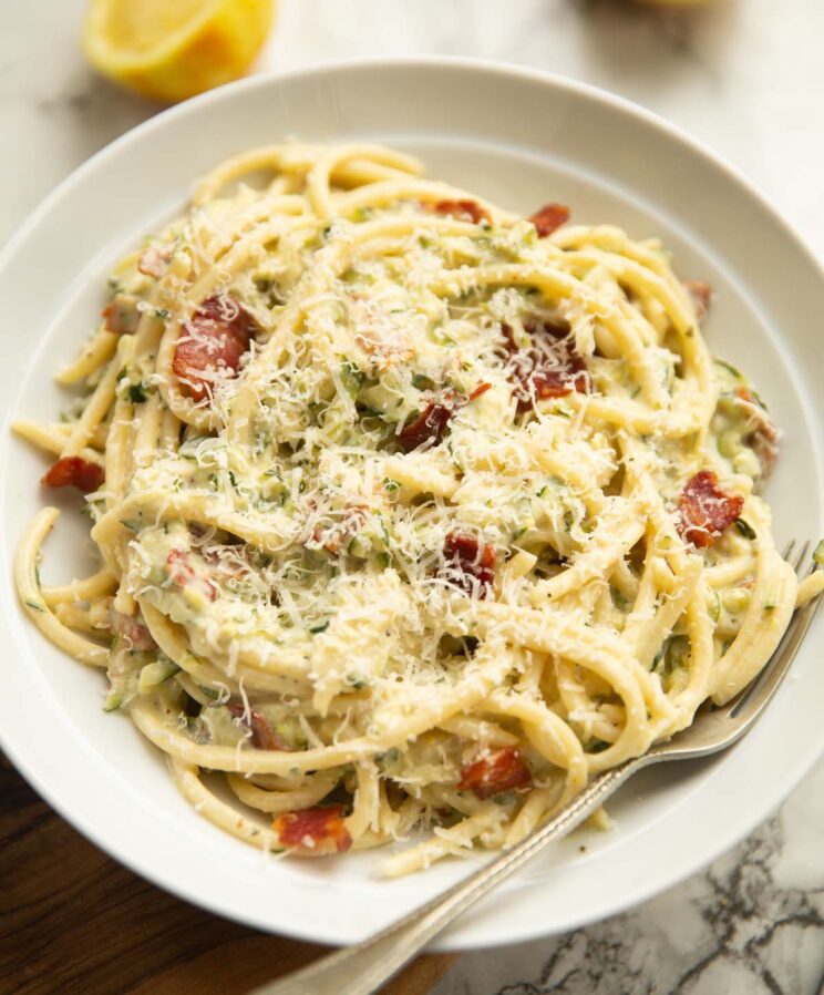 creamy courgette pasta creamy courgette pasta served in a large white dish with silver form